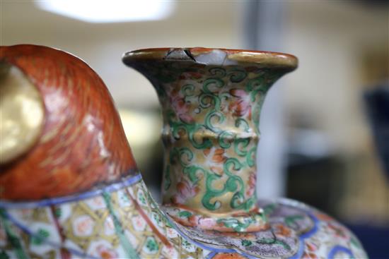 A Japanese Kutani porcelain lion dog candlestick, enamelled and gilt decoration and a Canton vase candlestick height 10cm